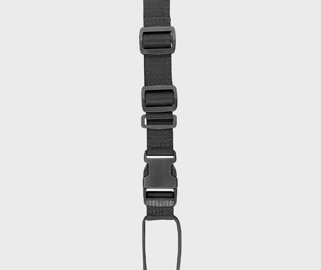 Adjust the slides of the Umbrella Strap to your height